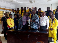 Isaac Asiamah and the Golden Arms team