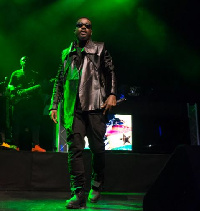 Sarkodie performing in his black Timberland boots