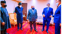 President Akufo-Addo (middle) confers with some of his peers