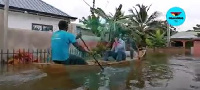 Some of the residents of Weija on a canoe