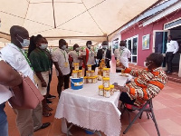 George N. Sarpong, CEO of Gensap (seated) interacts with some cashew experts