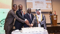 His Excellency Khalifa Yousif Al Zaabi, Hon. Osafo Maafo, NAPO cutting the cake