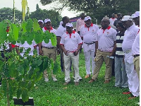 Otumfuo Osei Tutu II and others present at the tree planting exercise