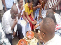 President Akufo-Addo eats with some citizens before 2016 general elections