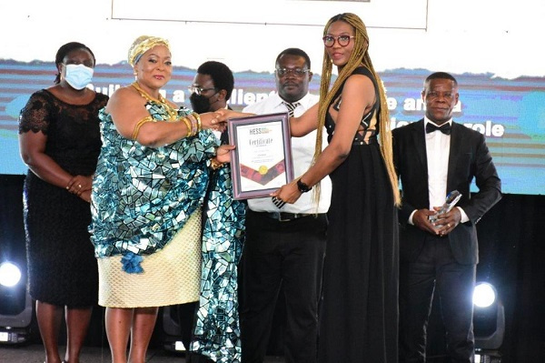 Mrs Winifred Setor Smith receives an award on behalf of MTN