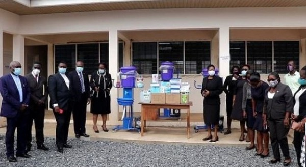 Members of the Accra Bar Association presenting relief items to some institutions