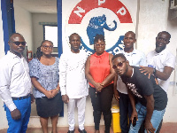 Abeka Dauda ( all white outfit)  with his supporters at the party's office