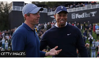 Woods (right) has not played since the Open Championship in July