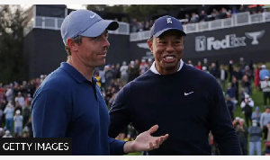 Woods (right) has not played since the Open Championship in July