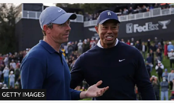 Woods (right) has not played since the Open Championship in July