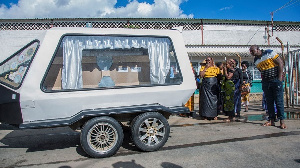 A hearse carrying the remains of Lemekani Nathan Nyirenda at Lusaka's Kenneth Kaunda Airport