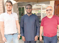 Nana Yaw Amponsah(middle) with officials of Fitcom HRH Sports