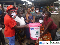 African Women International distributed Veronica bucket to traders Agona Market