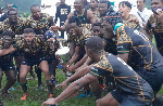 An elated Nigeria team lifting the trophy