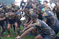 An elated Nigeria team lifting the trophy