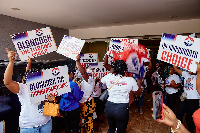 Some women with placards showing love for Alan Kyerematen