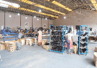 The Kumasi Shoe Factory produces over 700,000 shoes and sandals annually