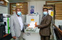 Left:Kwasi Poku Boateng, Director of USP Ghana with Professor Gyekye, Dean of the UG School of Pharm