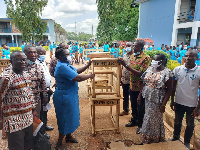 A symbolic presentation of one of the desk to Mr Appiah