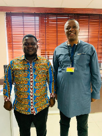 Jeremiah Quayson (left) in a pose with Albert Nyakotey after the meeting