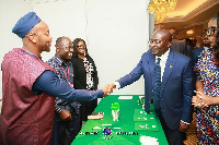 Dr Mahamudu Bawumia exchanging pleasantries with Mr Darryl Abraham Mawutor of Taptap Send Africa