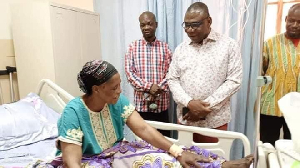 Hudu Mogtari with some of the patients at the hospital