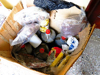 The harshish oil in gallons and plastic containers ready for shipment