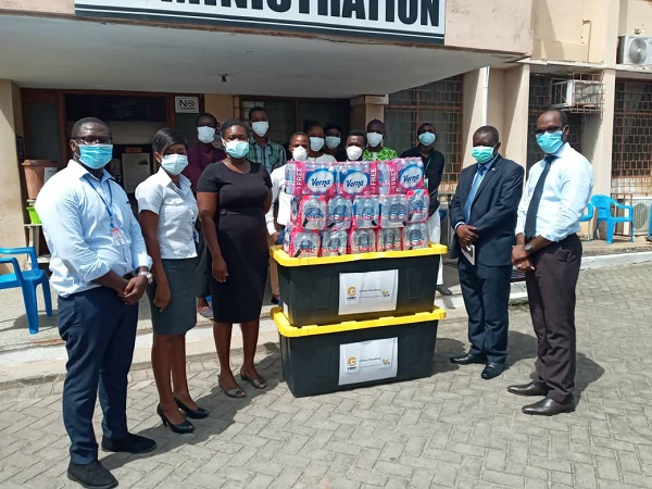 Officials with some of the supplies at the Korle Bu Teaching Hospital