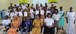 A group picture of the graduates, their parents and district teachers