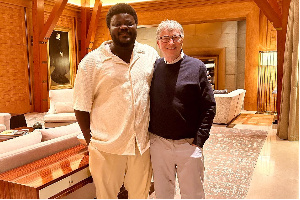 A visibly-happy Darlington Akogo with Bill Gates