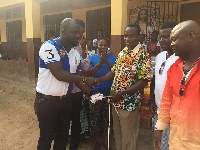 Officials of GH Sporting Club hand over the items