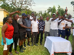 Winners of the tournament lift their trophy