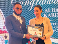 Alhasssan Abdul Karim receiving his award