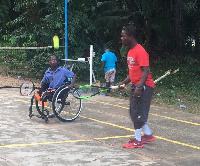 Promising Wheelchair tennis star, Zachariah with coach Yahya