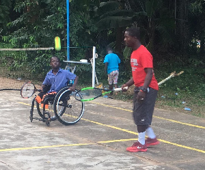 Promising Wheelchair tennis star, Zachariah with coach Yahya