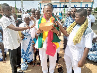 Prophet Anaglasi holding a calabash