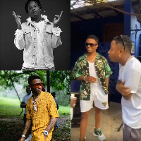 Kelvyn Boy spotted having a hearty chat with Wizkid