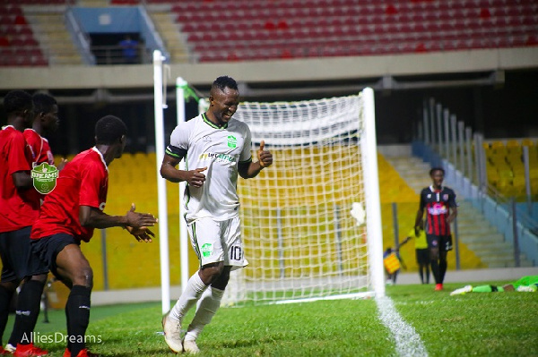 Former Accra Hearts of Oak forward, Joseph Esso in white