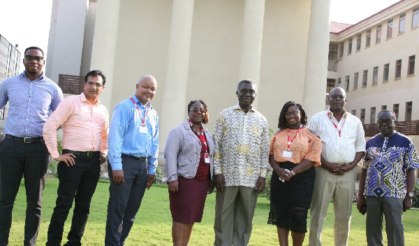 Prof. Frimpong-Boateng (L-4) and in a pose with some staff of the university