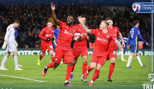 Chesterfield celebrate their goal in the 5 - 1 mauling by Chelsea