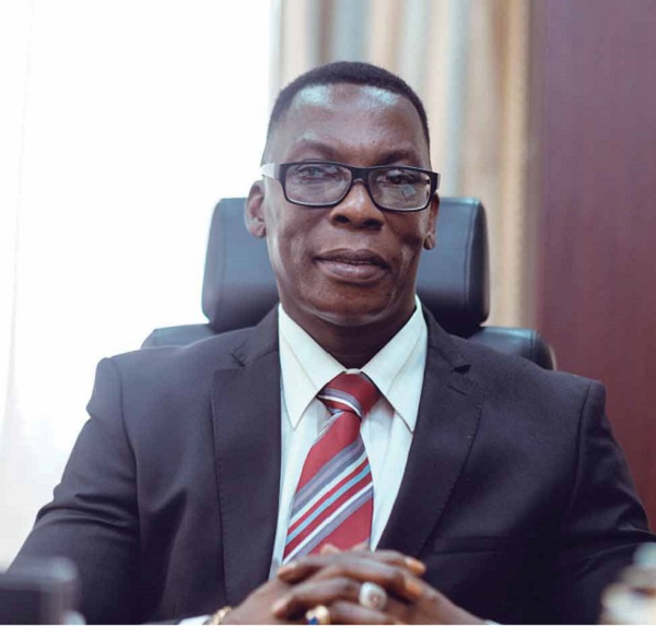 Dr Justice Yaw Ofori, NIC Commissioner