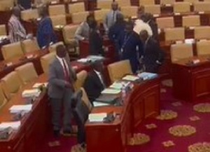 Muntaka hugs Ato Forson in Parliament