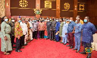 President Akufo-Addo in a psoe with the NPP Executives