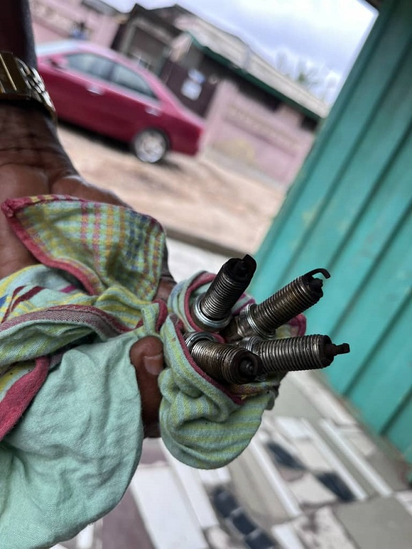 Image of damaged spark plugs shows effect of high manganese content found in fuel sold in Ghana