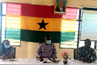 Edwin Agudey (middle), the Presiding Member of the Assembly speaks at the programme