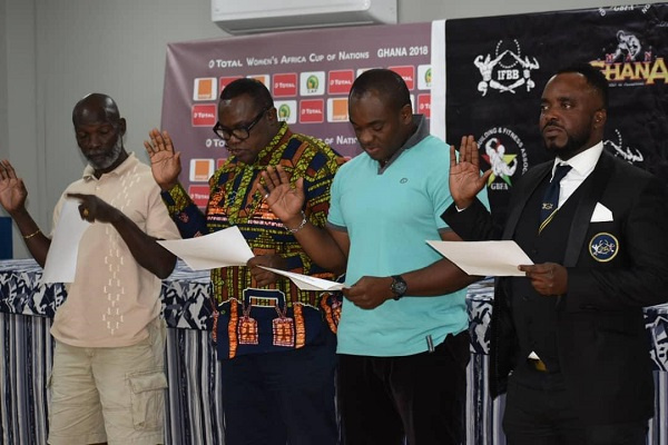 Mr Yartey (right) and the new executive taking the Oath of Office after the election