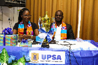 The victorious UPSA team with their trophy