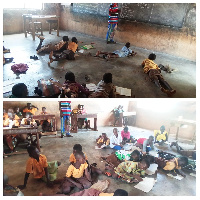 Pupils in Tantuo M/C Primary School on their stomachs