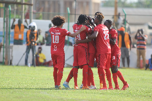 Asante Kotoko players celebrating a goal