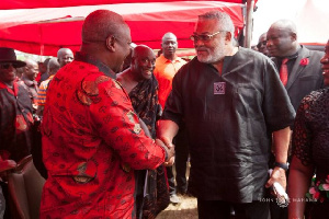 Former Presidents, John Dramani Mahama and Jerry John Rawlings exchange pleasantries